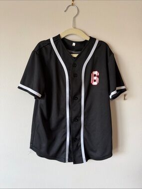 Black Baseball Jersey with White Trim and Red Number 6